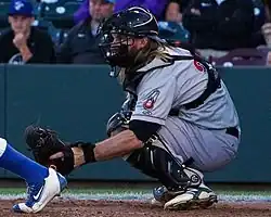 A baseball player in gray