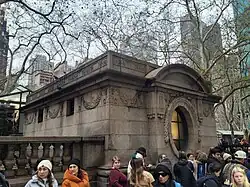 Side of the structure, seen from 42nd Street; a line waits to be allowed entry