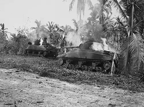 Burning U.S. tanks in Yigo