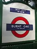 Station roundel displaying the former suffix "for Watling"