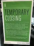 A sign for a Milwaukee/Chicago coffee shop chain in their Oconomowoc location indicates that the business has closed, their manufacturing operations will be unaffected, and employees will continue to be paid (the closure date on the sign has since extended further to the end of the stay-at-home order).