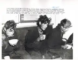 Kryuchkovsky, Poplavsky, Ziganshin consuming some soup and bread shortly after being rescued.