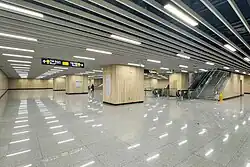 Line 8 platform 3 transfer passageway towards Lines 11 & 13, equipped with escalators and stairs