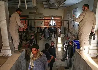 Memorial of martyrs of the Camp Speicher massacre in Saddam Hussein's presidential palace.