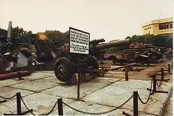 Captured French artillery and other military vehicles, including an M24 Chaffee, displayed at the Dien Bien Phu Museum.