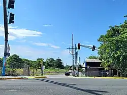Eastern terminus of PR-8869 at PR-5 junction, looking west