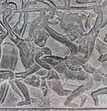 Bas-relief of intercepting a kick