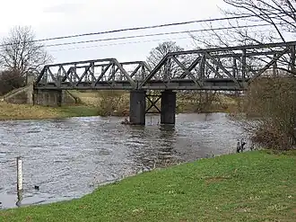 A three-span girder bridge over a river