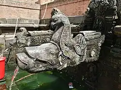 Stone spouts of Manga Hiti in Patan, with a telescopic sequence of water animals