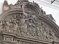 Tympanum on the north portal of the church of Santa Clara Monastery in Quito, Peru.