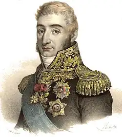 Sepia print shows a curly-haired and clean-shaven man wearing a military uniform that is heavily embroidered.