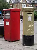 A gold box with red franking mail box (Enfield)