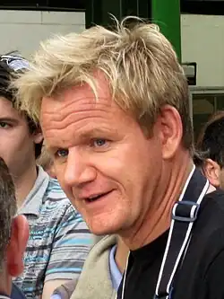 Headshot of Gordon Ramsay. He is a middle-aged, white man with blond hair.