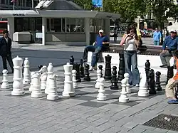 People playing outdoor chess