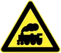 Locomotive railroad crossing ahead (without safety barriers)