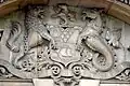 The arms above the entrance of John Bell House