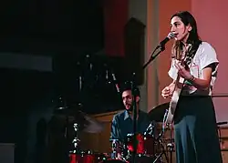 Brigitte Naggar performing as Common Holly