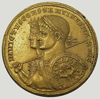 photo of gold coin issued by Constantine I with his picture and the god Sol's picture on it