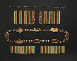 Cowrie shell girdle, lion bracelets, bracelets with the name of Amenemhat III, and anklets of Princess Sithathoriunet, The Met