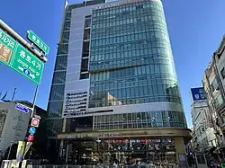 The building in 2023, after the film museum was established in the basement. It still mainly sells jewelry.