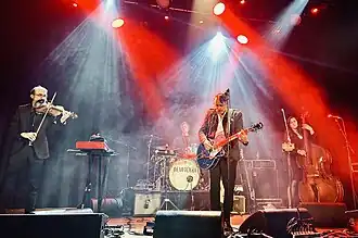 DeVotchKa performing at Islington Assembly Hall, London in 2025