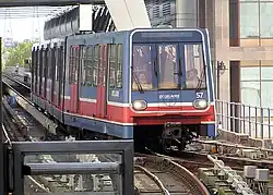 B92 stock train 57 arrives at Canary Wharf DLR station