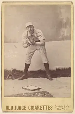 Doc Bushong on an 1888 Old Judge baseball card, showing glove.
