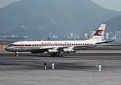A Garuda Indonesia Douglas DC-8 at Kai Tak Airport in 1967, showing an older livery
