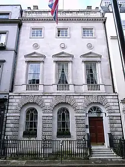 Ely House, 37 Dover Street, London. Altered by Smith and Brewer. They heightened the building and altered the interiors in 1907–09 and again in 1926–27.