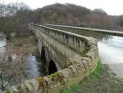The Dowley Gap or the Seven Arches Aqueduct by the civil engineer James Brindley carrying the Leeds and Liverpool Canal over the River Aire, Yorkshire