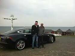 Dr Jeff Allan and his son Ben Cottam-Allan having completed their journey from Lands End to John o' Groats set off for the return journey in their Tesla electric car.