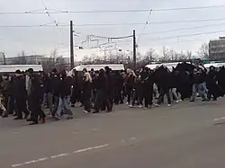 Young demonstrators, dressed in black
