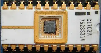 An EPROM. The small quartz window allows UV light to enter during erasure.