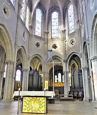The Choir and altar. The Chapel of the Virgin is visible in the apse.