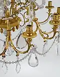 Drop-shaped pendeloque prisms on a chandelier.