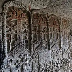Engraved crosses on the cave church wall in the Geghard Monastery.