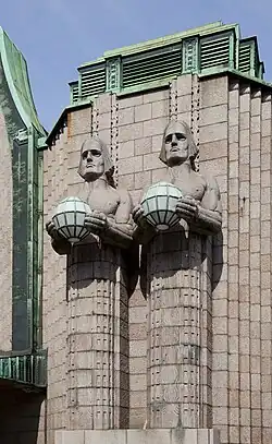 Statues at Helsinki Central railway station by Emil Wikström (1919)
