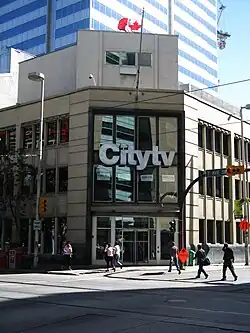 The corner of a three-story building with Citytv signage