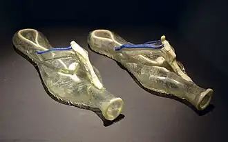 Sandal-shaped glass vessels