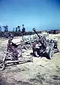 German Pak 39(r) (Converted ex-Soviet F-22 USV gun) and others, captured by Allies in Summer 1944.