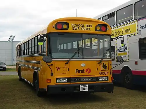 First Student TC/3000 RE "BWS YSGOL" (Welsh School Bus); RHD Blue Bird All American