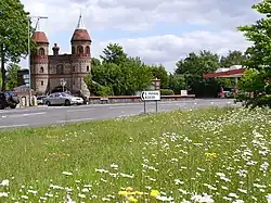 A view of one of the gatehouses, the design of which Ian Nairn described as "particularly violent"