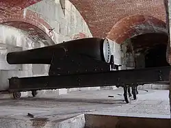 Photograph of a Rodman gun on a casemate carriage in Fort Knox, Maine.