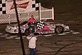 Kreyer in victory lane at Golden Sands Speedway in 2013