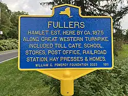 Sign at the intersection of Fuller Station Rd and Western Turnpike