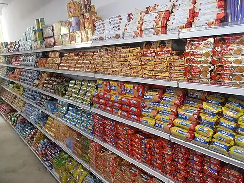 Parle biscuit products on the shelves of a supermarket