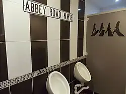Gents' toilets inspired by the Beatles album Abbey Road in Parkend, England