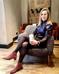 Woman wearing a mini-skirt and pantyhose