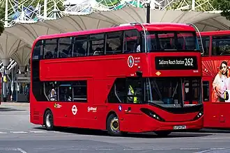 A Go-Ahead London red double-decker bus with a destination display for route 262 to Gallions Reach Station in Stratford bus station in London