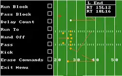 A horizontal rectangular video game screenshot that is a digital representation of an American football field with orange dots are arranged in a 4–3 defense formation. A black menu with white text covers half the screen and displays text with check boxes: Run Block, Pass Block, Delay Count, Run To, Hand Off, Pass, Kick, Erase Commands, and Exit Menu.